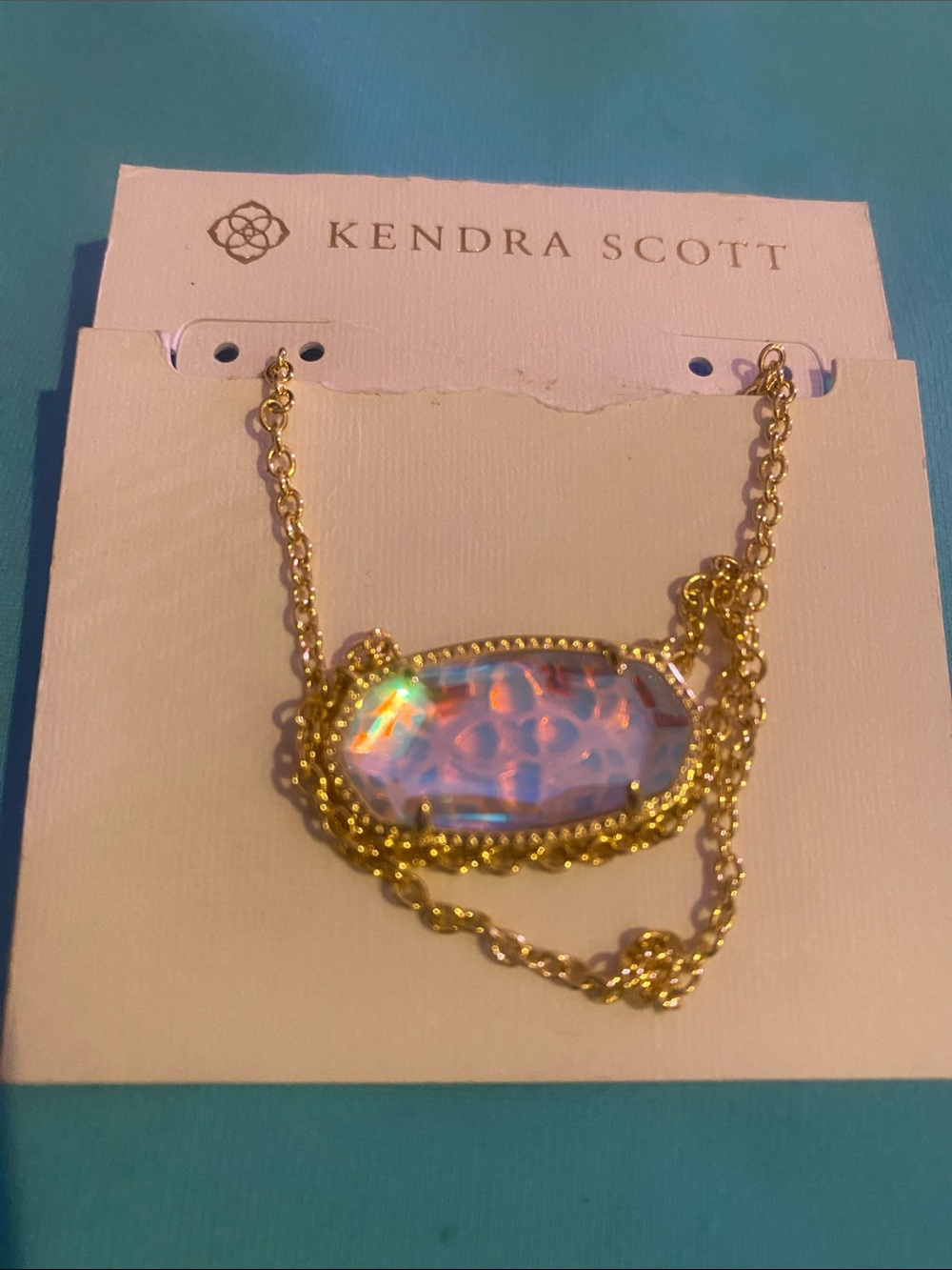 Kendra Scott Gold Necklace with Iridescent Pink-Blue Pendant